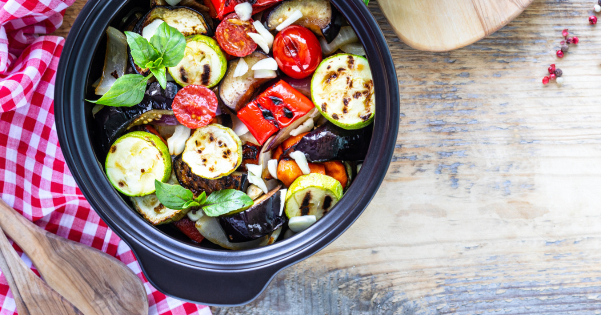 Colorful and healthy vegetarian crockpot recipes dishes served in bowls, perfect for quick and easy weeknight dinners